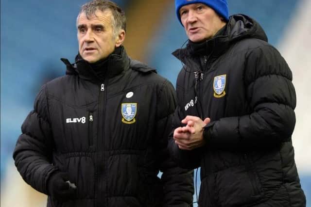 Neil Thompson and Lee Bullen have been reshuffled in Darren Moore's Sheffield Wednesday backroom staff.