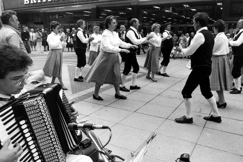 Bochum Folk Dancers from Sheffield's German twin town performing on The Moor in June 1986. Ref no: s29033