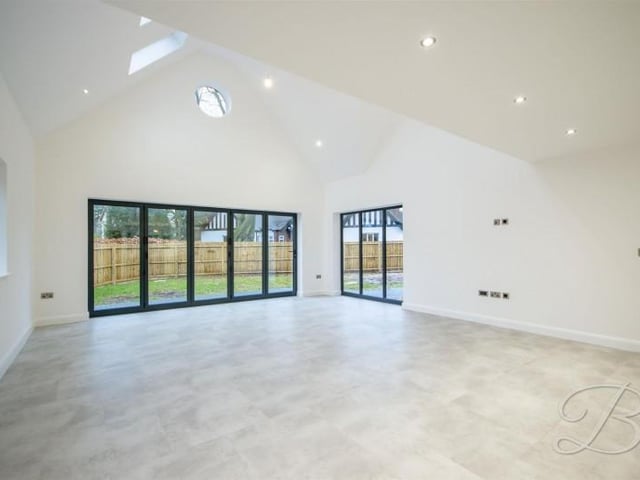 The estate agent's favourite room in the house, boasting a spacious open plan living area with an impressive vaulted high ceilings and bi-fold doors leading on to the rear garden, making this the "perfect space for entertaining".