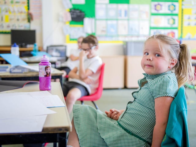 Some pupils of Medina Primary School return to school on June 1 - Lexi, 5, in her class