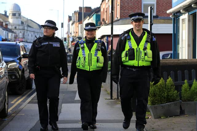 South Yorkshire Police walkabout around Sharrow. Pictured are Neighbourhood inspector Louise Kent, PCSO Sarah Hague, and PCSO Simon Griffiths. Picture: Chris Etchells
