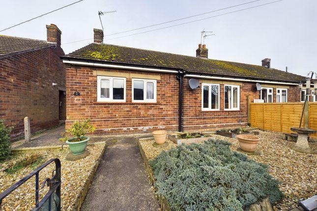 This two-bedroom semi-detached has a kitchen diner and enclosed rear garden. Price: £135,000
