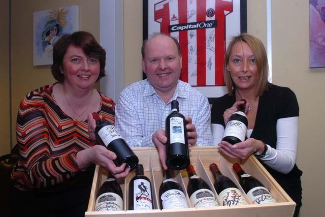 Pictured in 2007 at Bottles and Barrells, Broom Business Park, Sheepbridge, Chesterfield, where a collection of wine bottles all signed by Premiership Managers who visited Bramall Lane last season (2006)  was auctioned for Children in Need. The collection includes one signed by Pele. Seen is some of the collection LtoR are,  Janet Coghlan, Andrew Coghlan, and Claire Payne the Corporate Care Manager at Sheffield United.