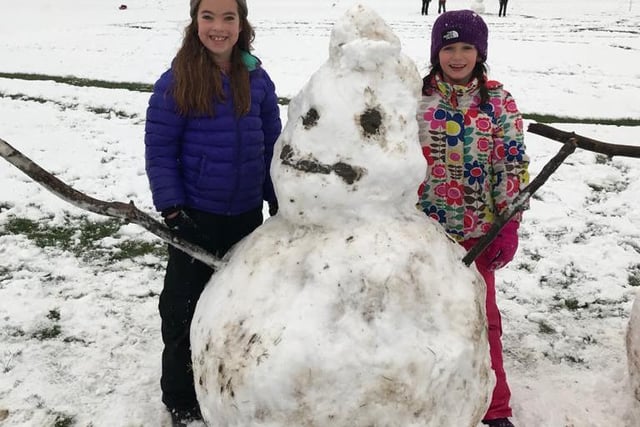 Children built a giant snowman in Tapton Field, Sheffield