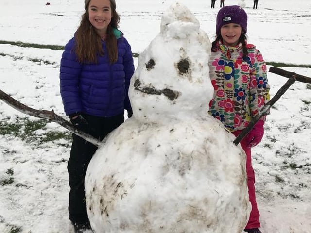 Children built a giant snowman in Tapton Field, Sheffield