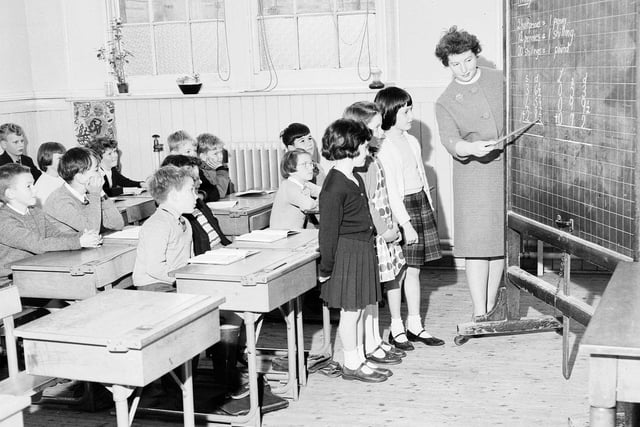 Pupils at South Morningside School being taught how to add up money in September 1963.