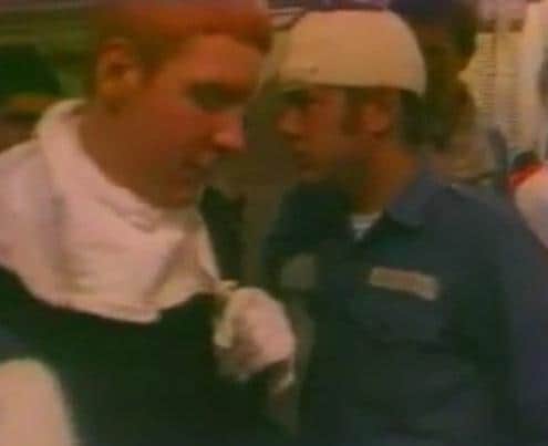John Galway (right) with his head bandaged after the HMS Sheffield was hit during the Falklands conflict, killing 20 people