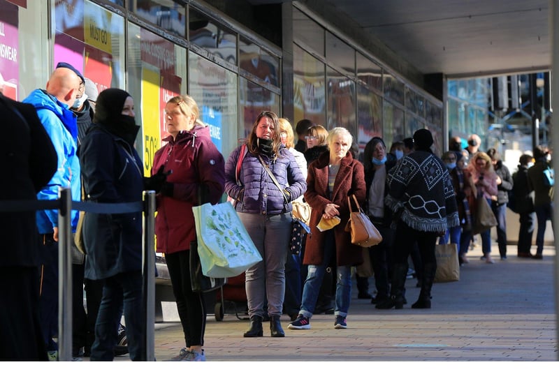 Shoppers queue to pick up a bargain at Debenhams on The Moor, Sheffield on the first day that non-essential shops reopened