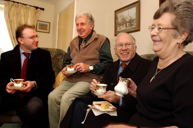 Jeff Rooker (third left), the Government's Regeneration Minister, chats to Castle Street, Conisbrough residents Benny and Mary Wilkinson, watched by Doncaster's Deputy Mayor, Councillor Aidan Rave, pictured in 2003