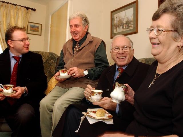 Jeff Rooker (third left), the Government's Regeneration Minister, chats to Castle Street, Conisbrough residents Benny and Mary Wilkinson, watched by Doncaster's Deputy Mayor, Councillor Aidan Rave, pictured in 2003