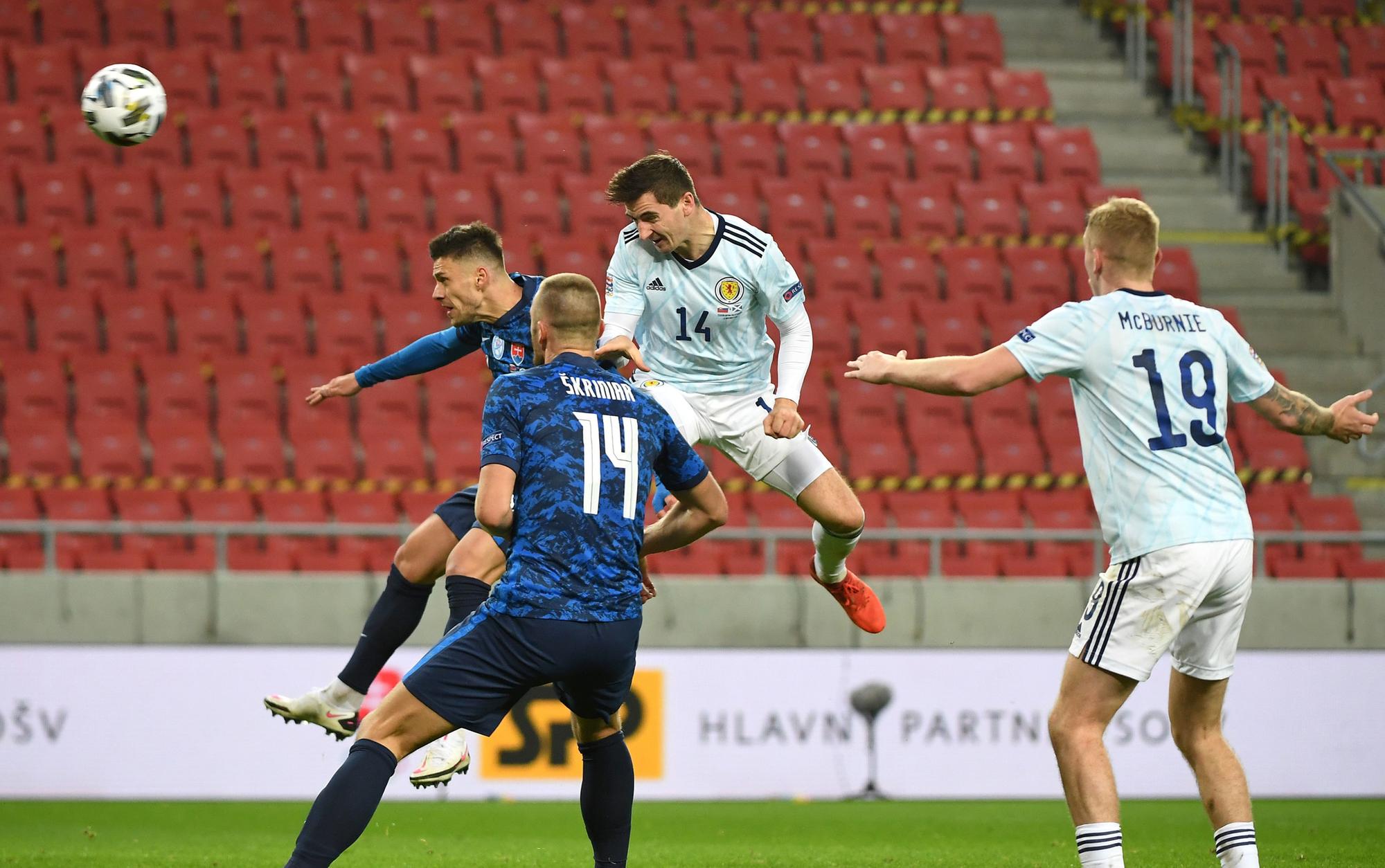 Kenny McLean heads towards goal during Scotland's clash with Slovakia. Picture: PA