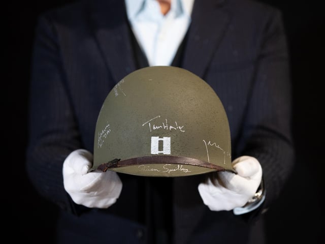 Captain Miller's (Tom Hanks) cast-autographed helmet from the 1998 film Saving Private Ryan (estimate £10,000-£15,000).