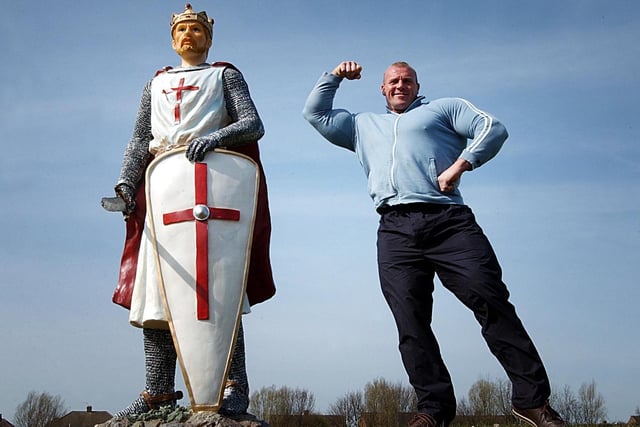 Strongman Eddy Ellwood was pictured with his trophy from the 2003 England's Strongest Man competition.