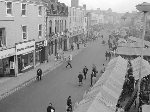 West Gate in 1972, with a bustling market and lots of shoppers