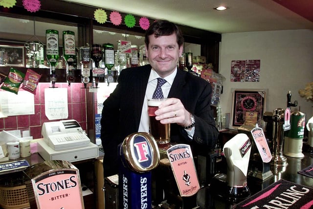 Marketing company boss and Sheffield United fan Anthony Hinchliffe behind the bar at the Railway Hotel, on Bramall Lane, Sheffield, in 2002, after he bought the pub.
