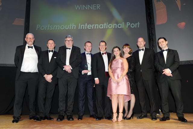 Sam Ingram, business development manager from sponsor Havant & South Downs College, right, with winners of the Sustainable Business Award Portsmouth International Port.
(210220-8466)