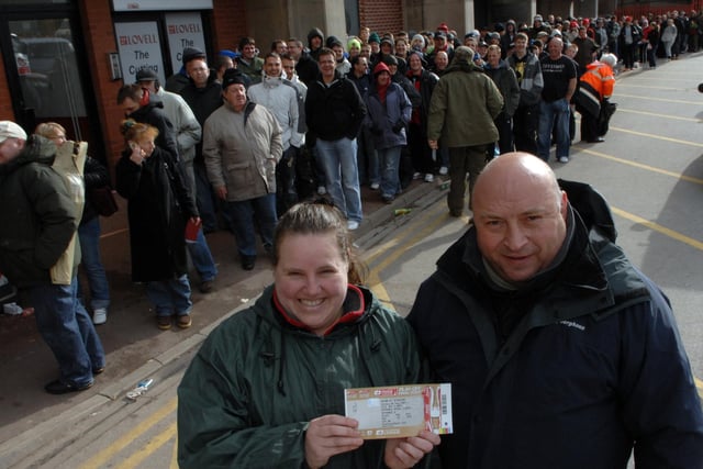Sheffield United fans Joanne and Paul Dawson with Wembley tickets for family and friends after queueing for 15 hours overnight