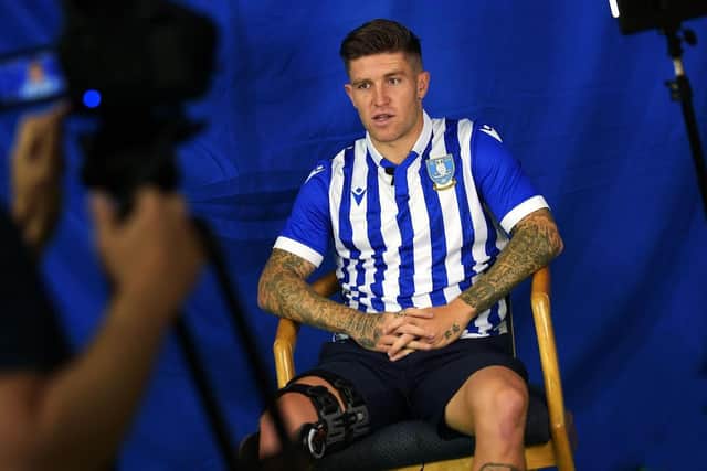 Josh Windass has signed a new contract at Sheffield Wendesday.
