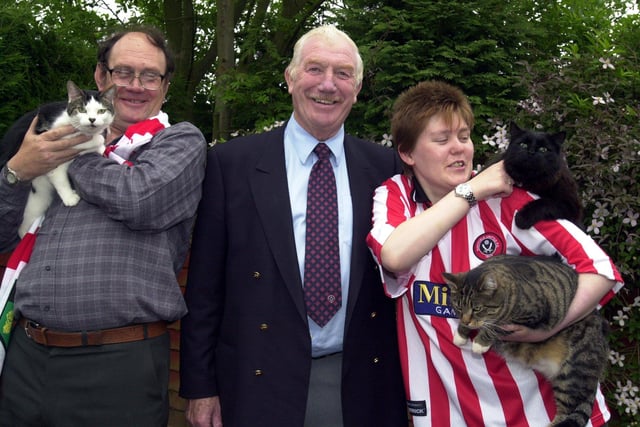 Late Sheffield United chairman Derek Dooley with fans Reg and Susie Pantling and their cats, named after Blades players, Tommy, Bobby and Bladey