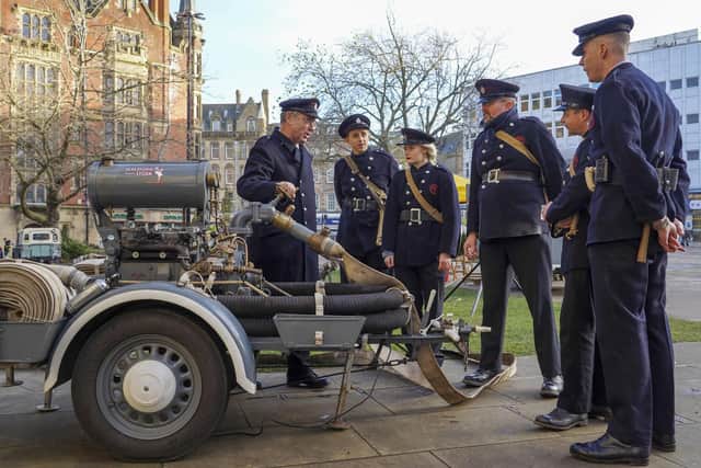 Sheffield Blitz event at Sheffield Cathedral - members of the National Fire Service Vehicles Preservation Society and a water pump that was used to fight fires