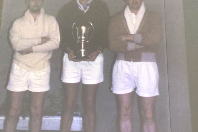 Bill Betts, holding the cup, with the men’s league winners of 1965