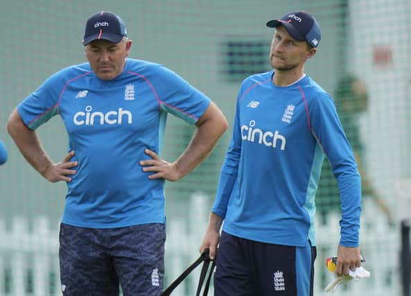 England's cricket coach Chris Silverwood, left, speaks his team captain England's Joe Root (AP Photo/Alastair Grant)