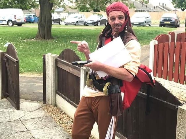 Postman David Evans on his rounds in Edlington