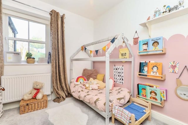 The second bedroom has been set up by the current owners for a young child. But it is a good-sized double with fitted wardrobes, a carpeted floor and a front-facing, double-glazed window.