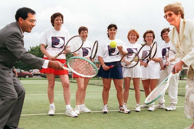 In 1998 this group of tennis players was trying to raise money for charity - they are joined by Mayor Yvonne Woodcock and Dr Wazir Baig.