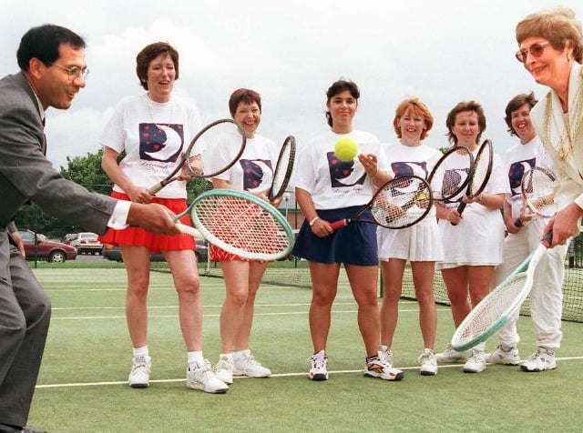 In 1998 this group of tennis players was trying to raise money for charity - they are joined by Mayor Yvonne Woodcock and Dr Wazir Baig.