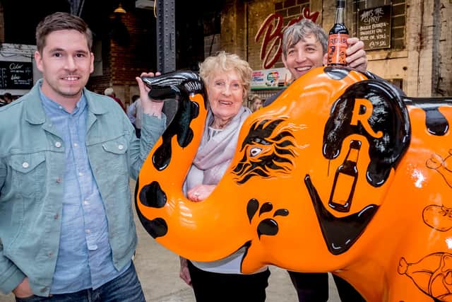 Pamela Freeman with the Henderson's Relish elephant at a 'Herd of Sheffield' preview evening in 2020 with artist Matt Cockayne, left, and Sheffield Children's Hospital Charity director David Vernon-Edwards.