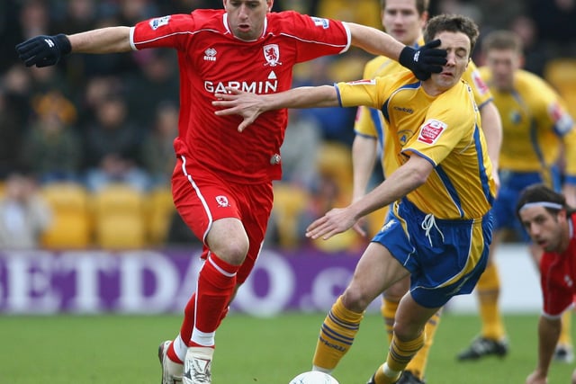 Fabio Rochemback holds off a challenge from Michael Boulding.