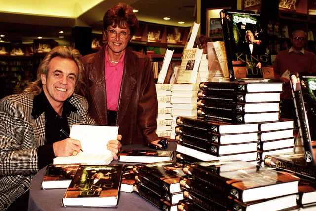 Peter Stringfellow signs a copy of his book at Dillon's, Meadowhall, for Mrs Pat Bridges. September 1996.