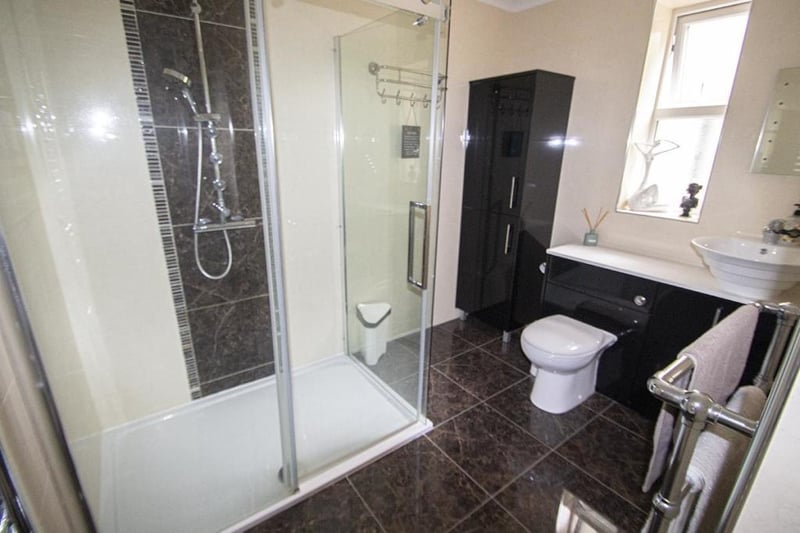 The bathroom has been recently refitted and boasts a large double shower cubicle.
