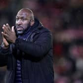 BARNSLEY, ENGLAND - MARCH 21: Darren Moore, Manager of Sheffield Wednesday, applauds the fans following the Sky Bet League One between Barnsley and Sheffield Wednesday at Oakwell Stadium on March 21, 2023 in Barnsley, England. (Photo by George Wood/Getty Images)