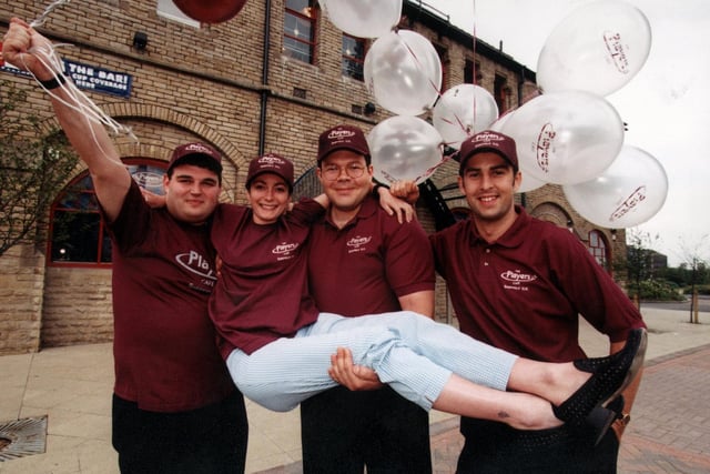 From left to right:- Daniel Dawson, Justin Nix, Andy Wells and being held is Rachel Law.