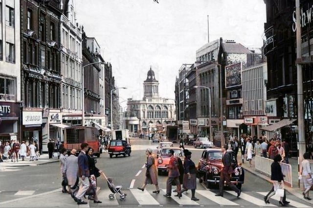 This colourised picture shows Fargate in 1960 - a time when cars could still drive up what is now a pedestrianised area