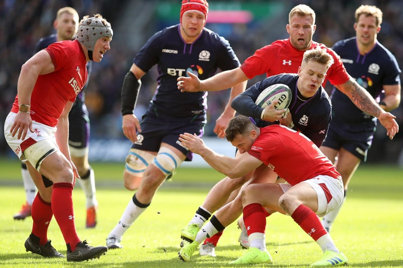 2019: Scotland 11, Wales 18
A 58th-minute try by Hawick's Darcy Graham wasn't enough to avert defeat as the Welsh headed towards their first grand slam since 2012. Graham is pictured here being tackled at that game at Murrayfield on March 9, 2019, in Edinburgh. (Photo by Ian MacNicol/Getty Images)
