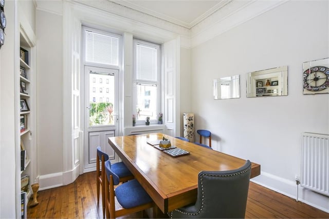 This spacious dining room looks out over the garden - a relaxing place to have your tea.