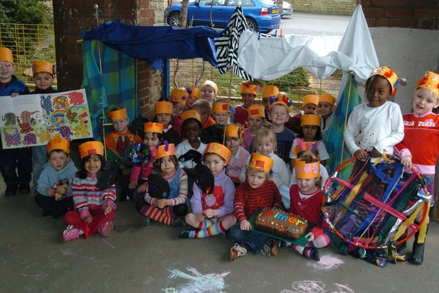 Reception pupils at Manor Lodge Primary School,  City Road, Sheffield in fancy dress for their World Book Day book Elmer the Elephant. Seen are pupils in the den they built and the book