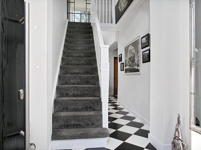 The house has a spacious entrance hall.