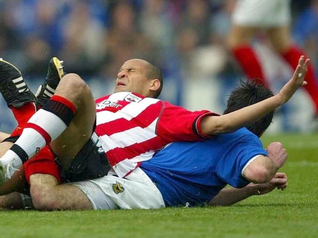 Nigel Quashie was welcomed back to Fratton after going up the M27 in Hughesy's own inimitable manner