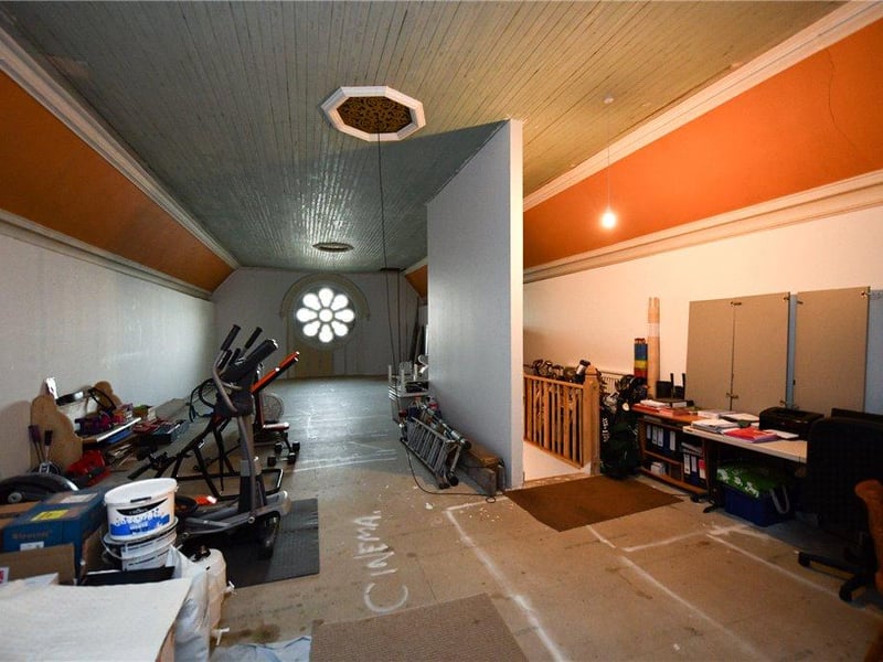 Upper level - currently used as gym, office and for storage.