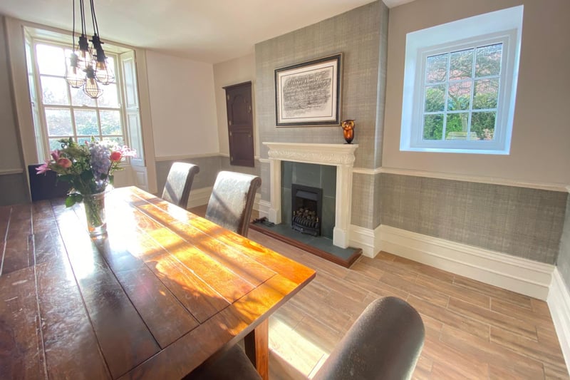 Double-glazed sash window to the front with window seat and original wood shutters. A nice feature of the room is the inset gas living flame-effect fire with tiled inset hearth and ornate surround.