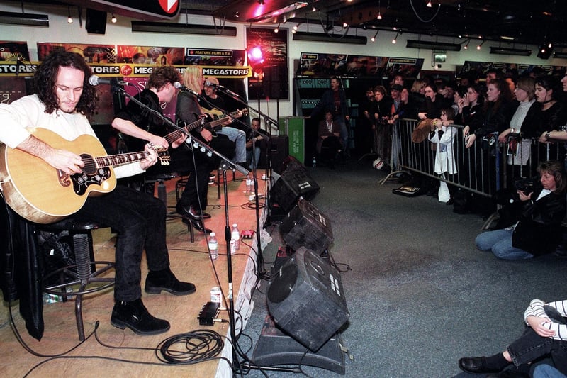 Def Leppard play an acoustic set at the Virgin Megastore in 1996