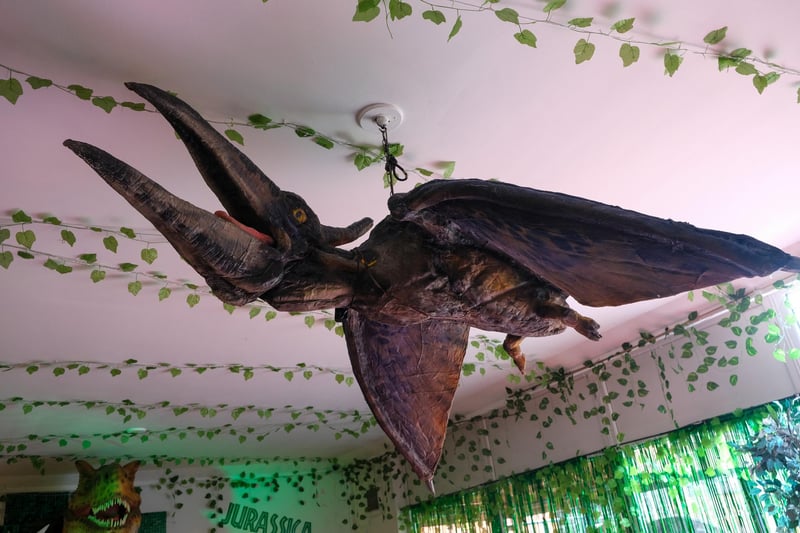 The Pterodactyl suspended from the ceiling adds to the prehistoric atmosphere