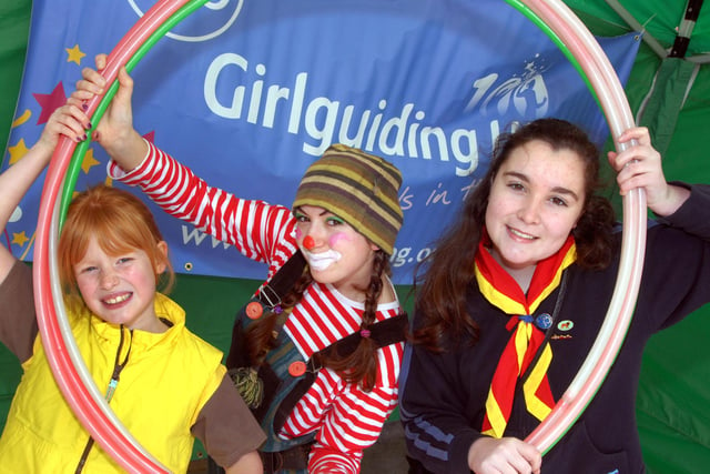A girl Guide activity fun day was held on Mansfield Market place in 2010 and out picture shows from the left Katherine Pitt, Jane Selby The Joker Entertainment and guid Ellie Pheasant