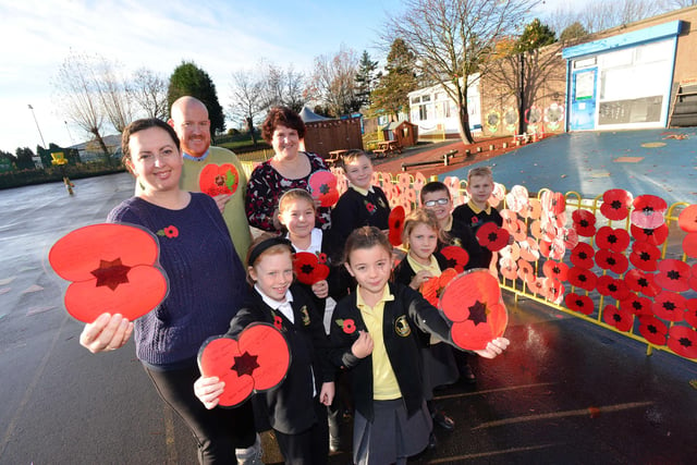 Bede Burn Primary School remembrance display 5 years ago. Pictured with students are the staff from left, Headteacher Nicola Faulkner, teaching assistant Glenn MacIntosh and class teacher Amanda Lenney.