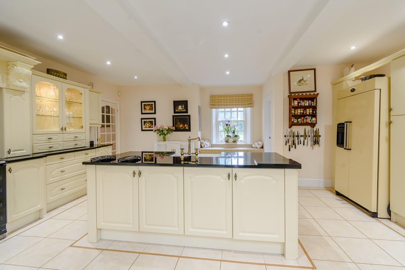 An expansive dual aspect kitchen/breakfast room, fitted with a comprehensive range of units.
