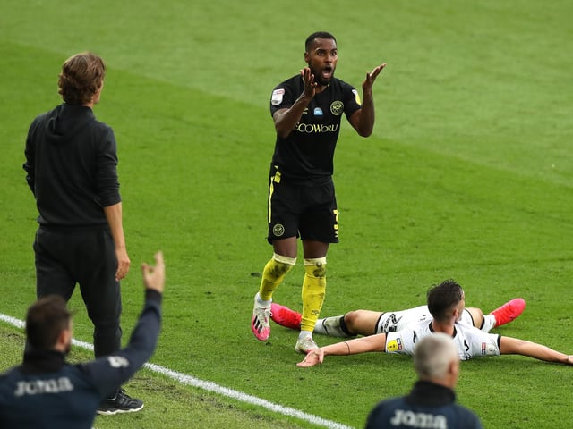 Brighton & Hove Albion are plotting a move for 23-year-old Brentford star Rico Henry ahead of the new campaign. (The Sun)